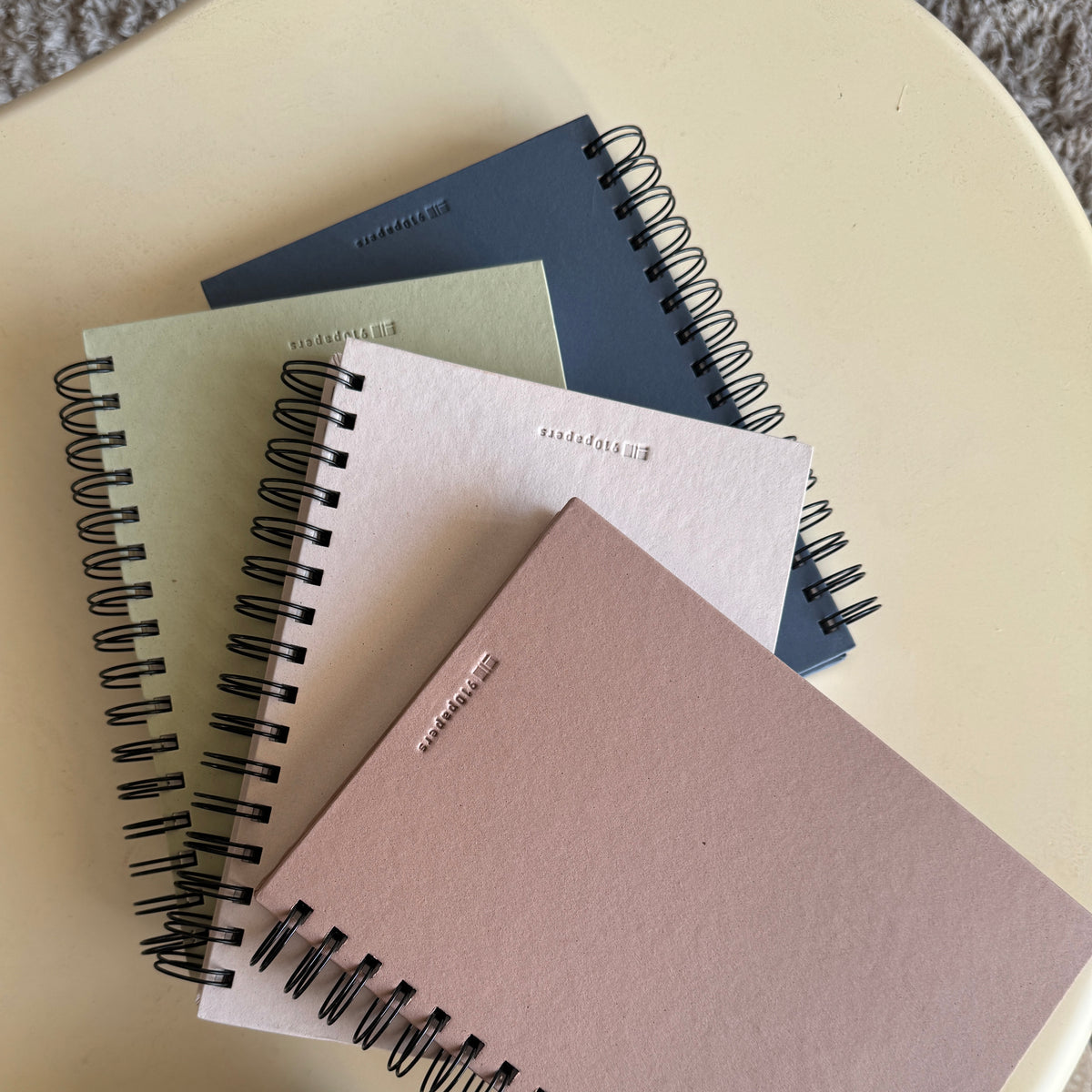 910 papers . spiral notebook